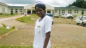 Loness Eliya outside Nkhata-Bay district hospital in the Northern region of Malawi during practical work-second year at Kamuzu College of Nursing (KCN)