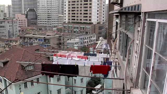 Shanghai, Over the Rooftops of Buildings behind Nanjing Road West, looking North China, 2000s