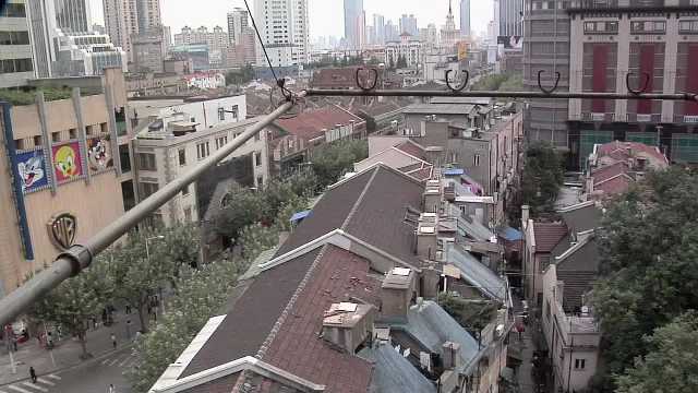 Shanghai, Over the Rooftops of Buildings behind Nanjing Road West, looking North China, 2000s
