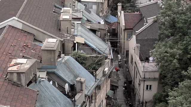 Shanghai, Elevated View to the  Rooftops of Buildings behind Nanjing Road West China, 2000s