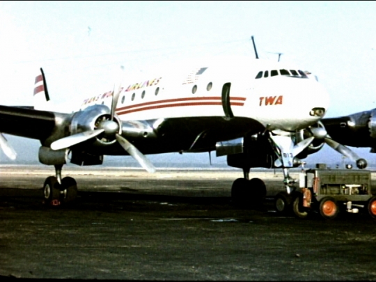 TWA Constellation, Taxiing, Passengers Exit Airplane, 1950s