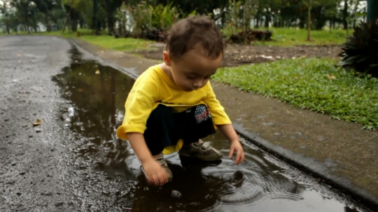 Marlon in Puddles, Indonesia, 2010s