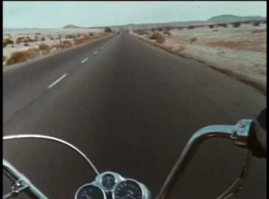 Motorcycle Gang Driving on Desert Highway, USA, 1960s