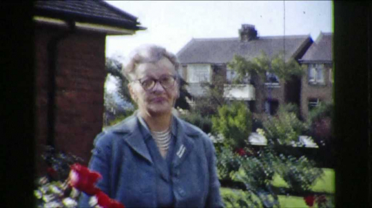 Senior Woman in Front of House, England, UK, 1950s