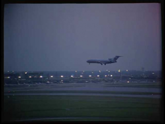 American Airlines Landing at Dallas-Fort Worth Airport, Night, USA, 1990s