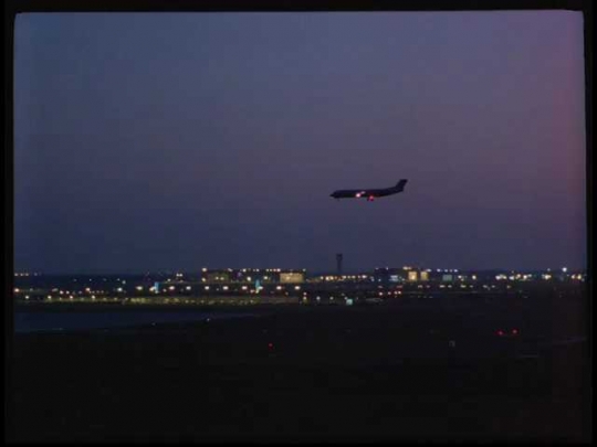 Plane Landing at Dallas-Fort Worth Airport, Night, USA, 1990s