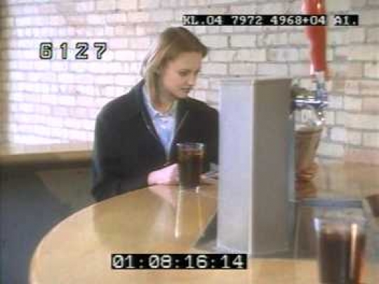 Young Couple Greet Each Other in Bar, USA, 199os