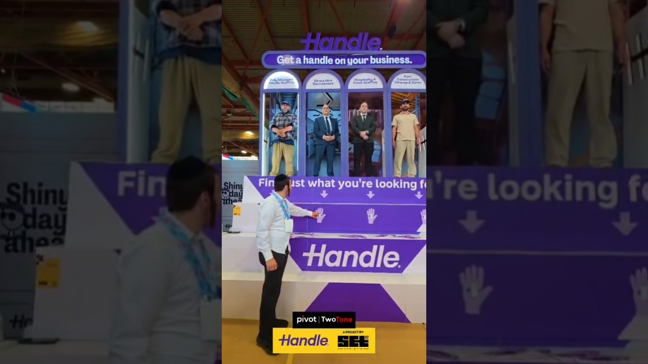 'Handle' Both At The "Satmark Expo"