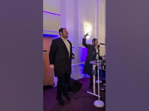 Avrumi Cohn And Kalmey Schwartz Performing at a wedding