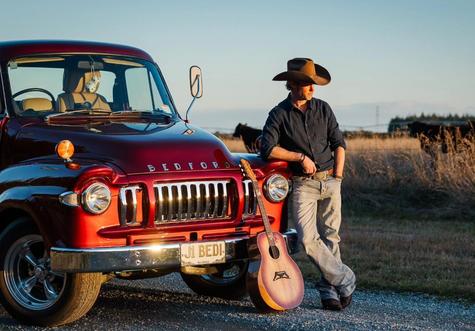 Local man sells first guitar to famous country singer