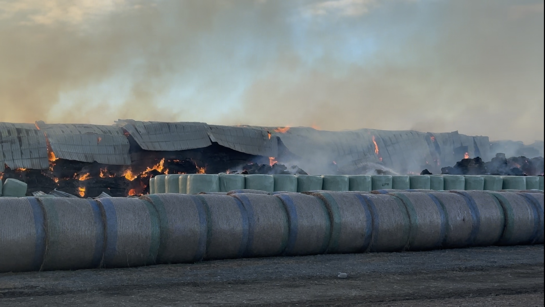 Massive fire eats thousands of hay bales Massive fire eats thousands of hay bales