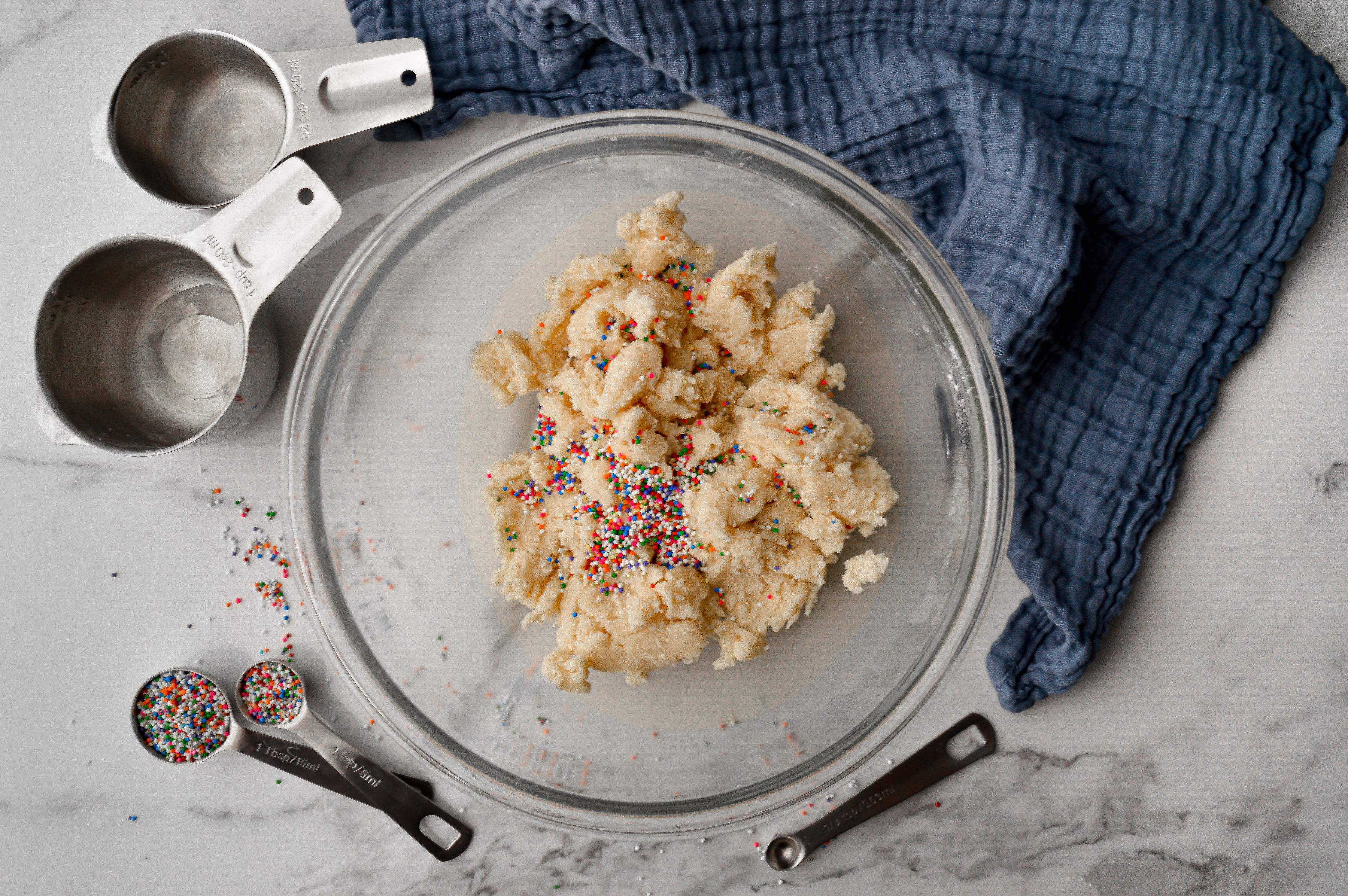 Image of Slowly add the flour and mix until a dough forms....