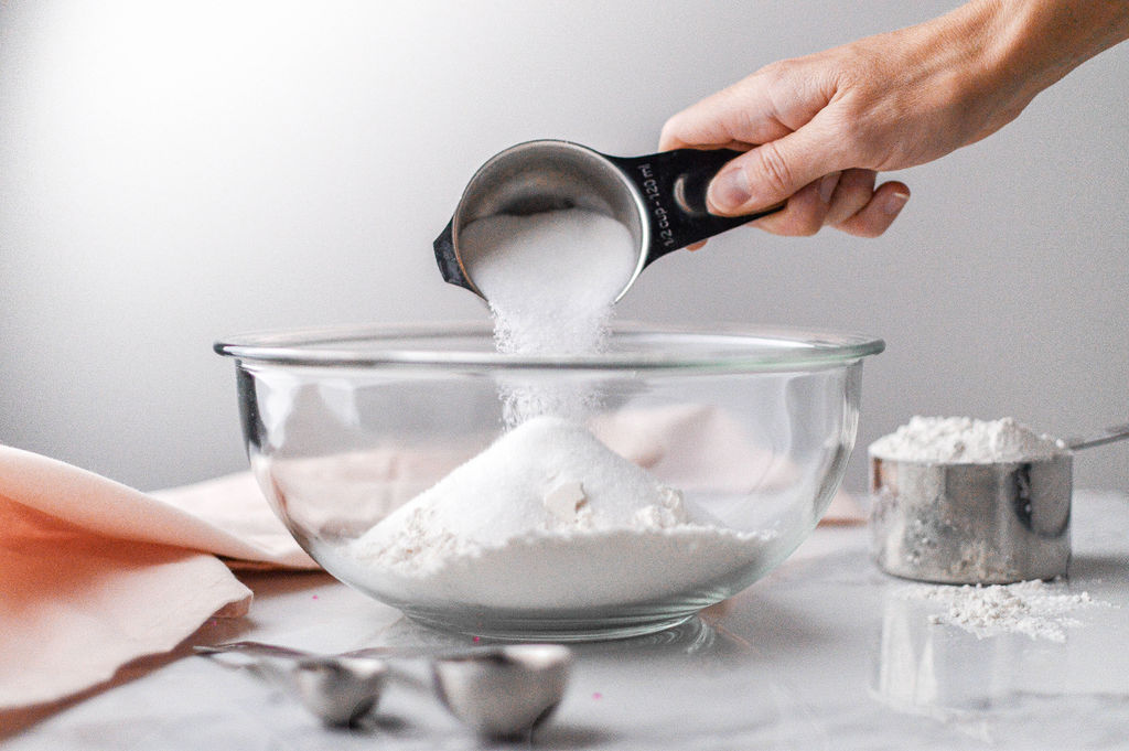 Image of In a medium sized mixing bowl, combine flour, sugar, baking...