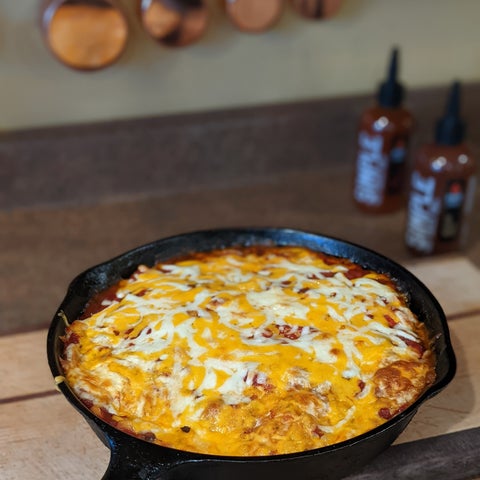 Image of Serve topped with sour cream, hot sauce and cilantro, enjoy!