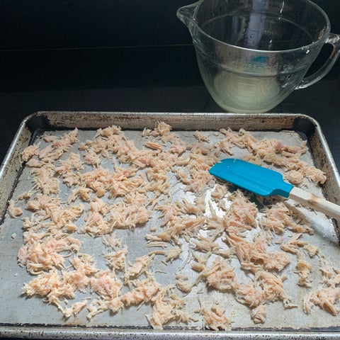 Image of Place chicken in a single layer on a cookie sheet...