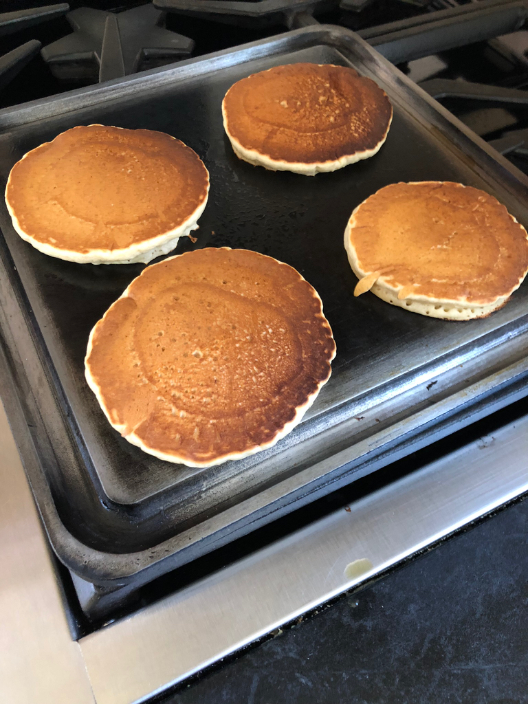 Image of Ladle on a generous amount of batter for each pancake....