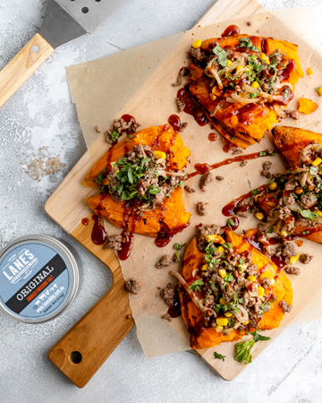 Image of Top smashed sweet potato with mince mixture, parsley, sauce and...