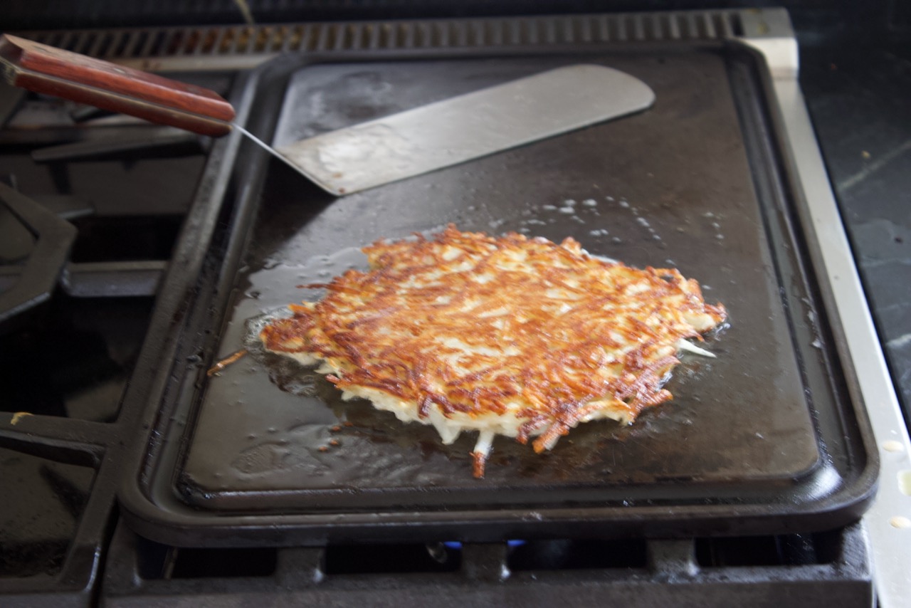 Image of Flip and pour remaining butter on top. Cook for additional...