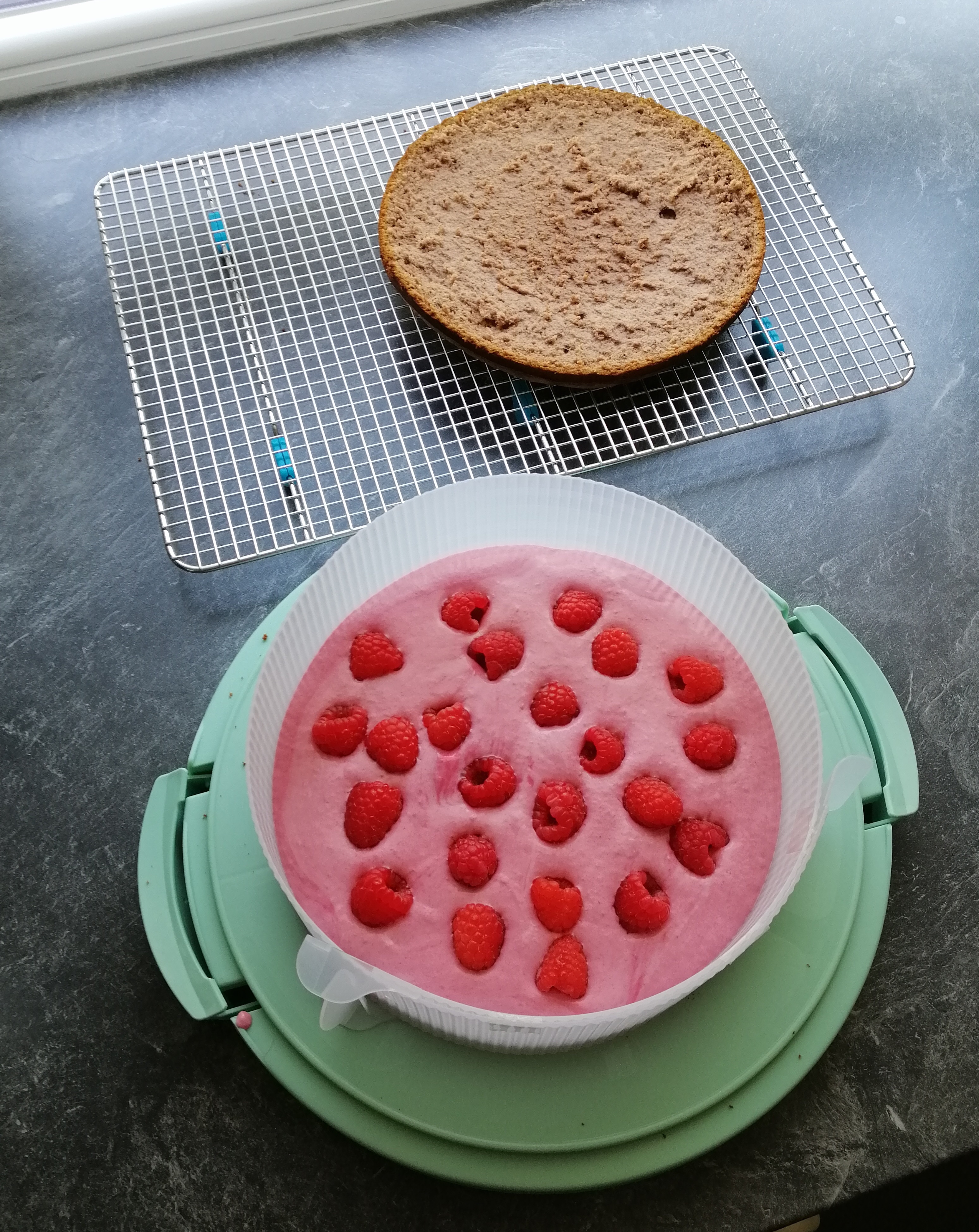 Image of Halve the sponge cake horizontally and place a cake ring...