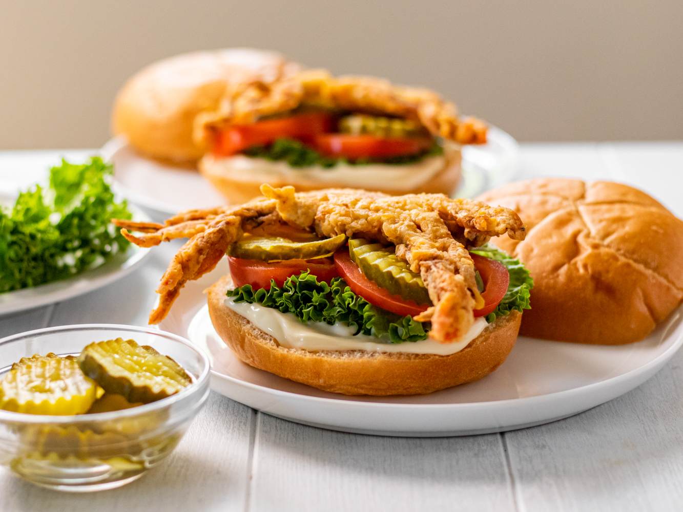 Image of Spread mayonnaise on the bottom of each roll. Top with...