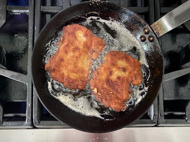 Image of Carefully place chicken into pan and get it a little...