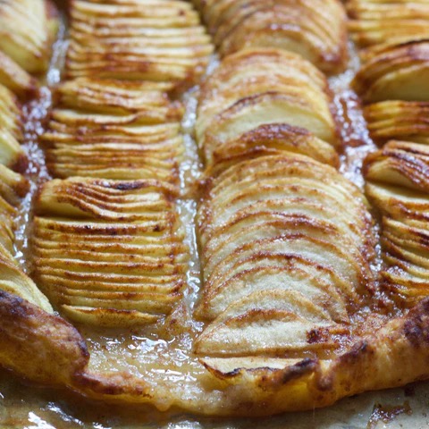 Image of Brush the tops of the apples with tasty butter mixture.