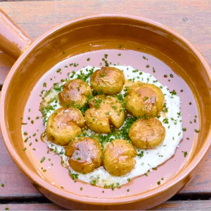 Photo of Smashed Potatoes with Garlic Confit Creme Fraiche