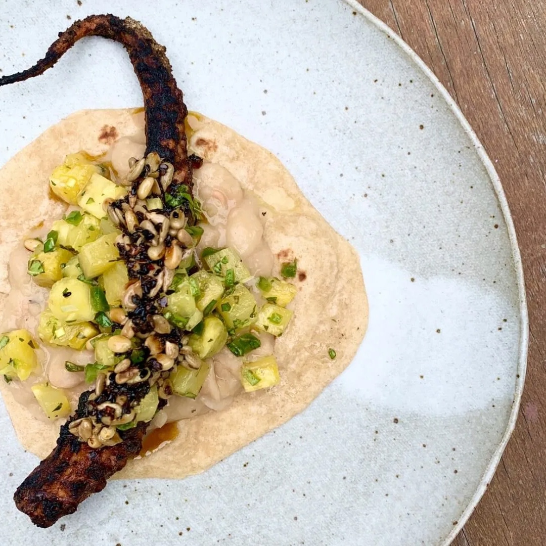 Photo of Octopus Taco with Pineapple and Salsa de Semilla