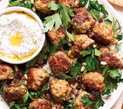 Photo of Herby Spiced Meatballs with Pinenuts & Golden Raisins
