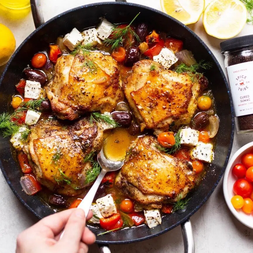 Photo of Crispy Spiced Chicken with Olives, Tomatoes & Feta in a Savory Brothy Sauce