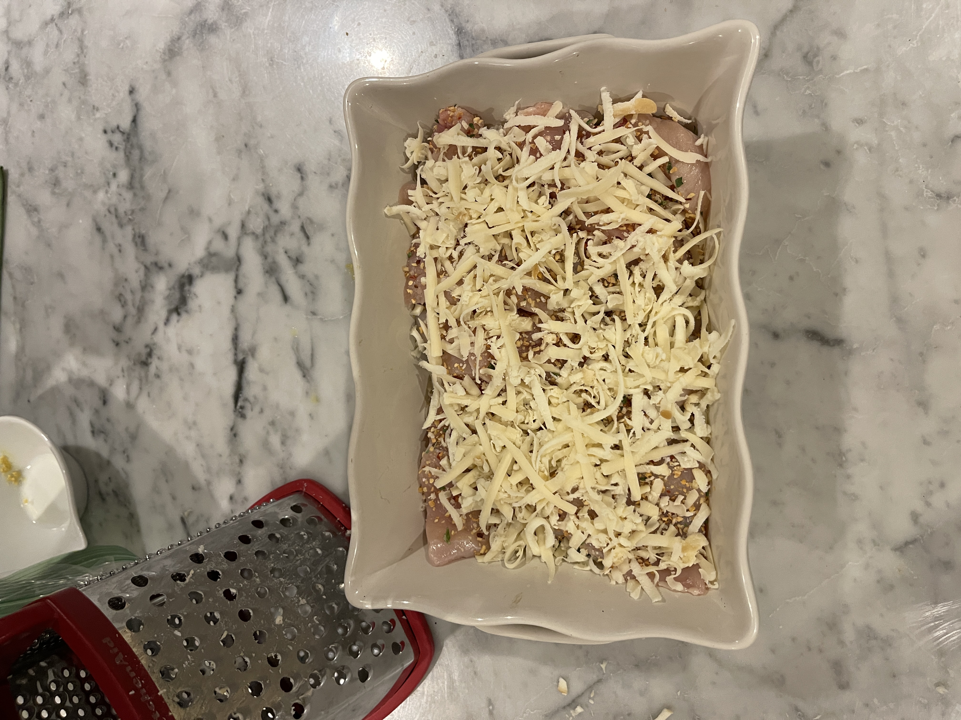 Image of Sprinkle the cheese over the chicken and then with the...