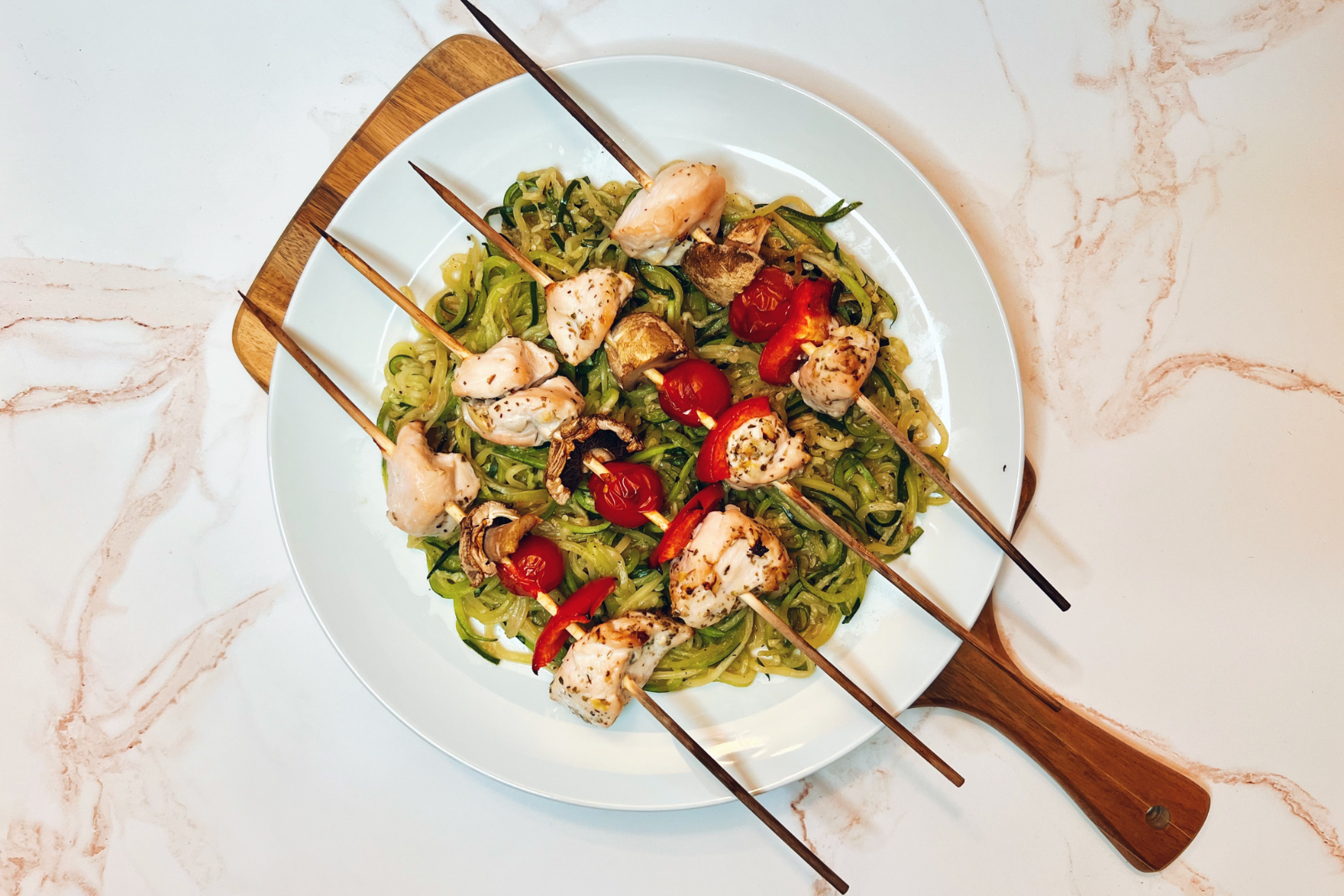 Chicken and Veggie Kabobs Over Zoodles
