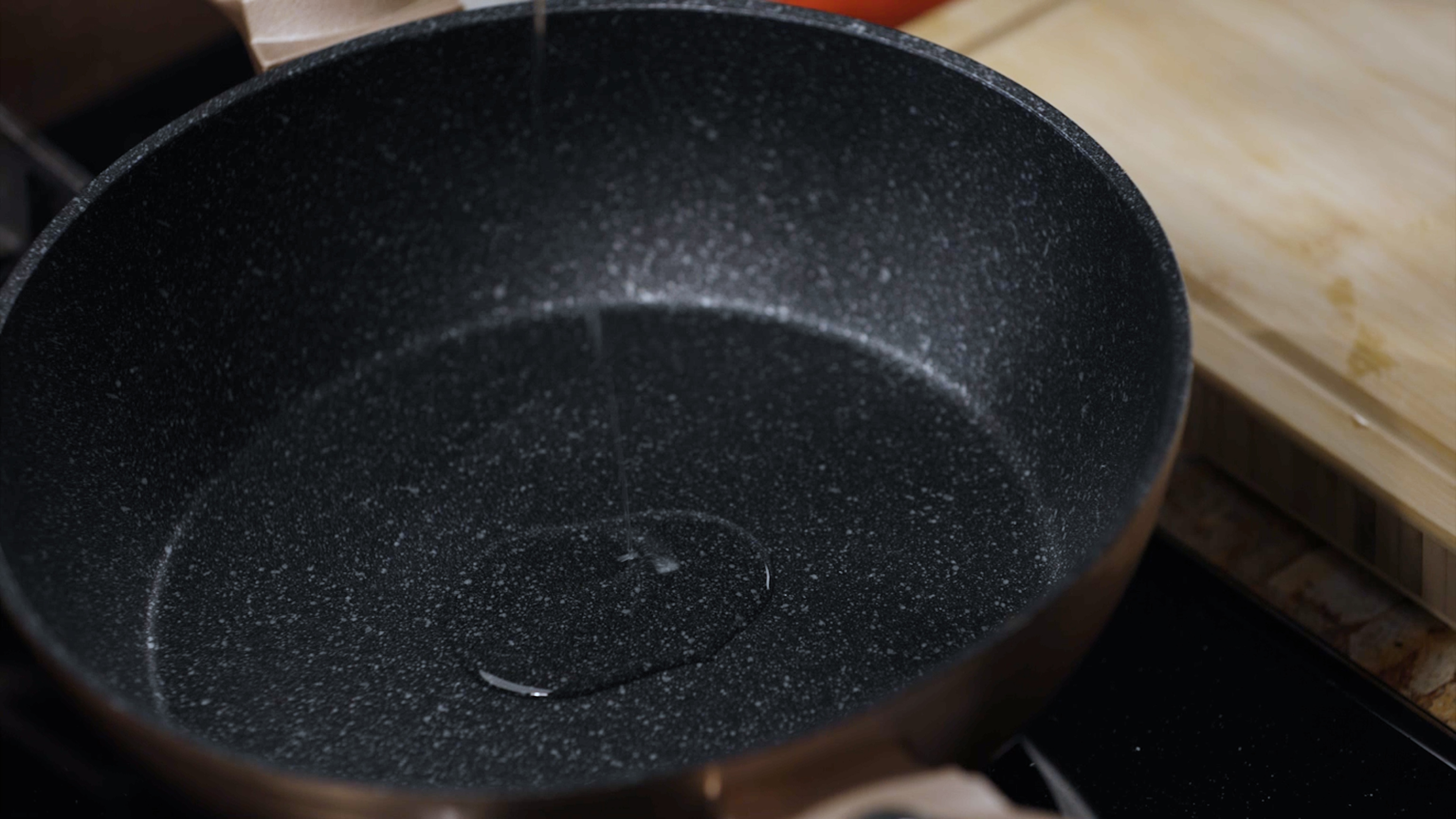 Image of Add a dash of oil to a pan.
