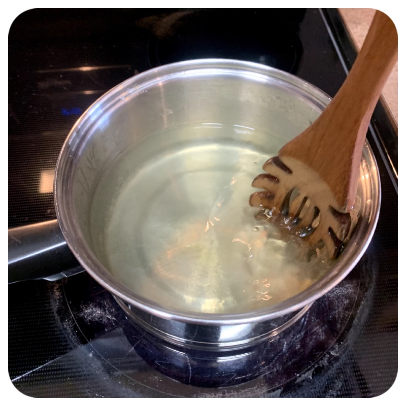 Image of In a small saucepan, heat 2 tablespoons of honey and...