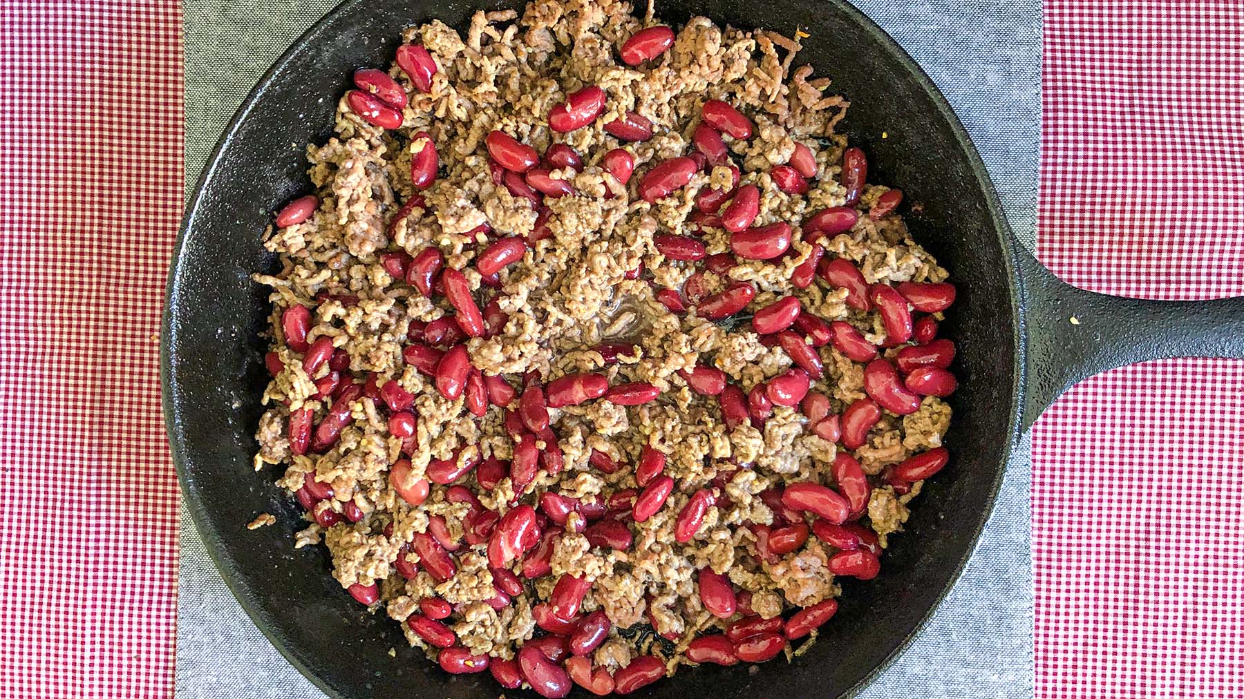 Image of Brown ground beef and season with salt, pepper, and garlic...
