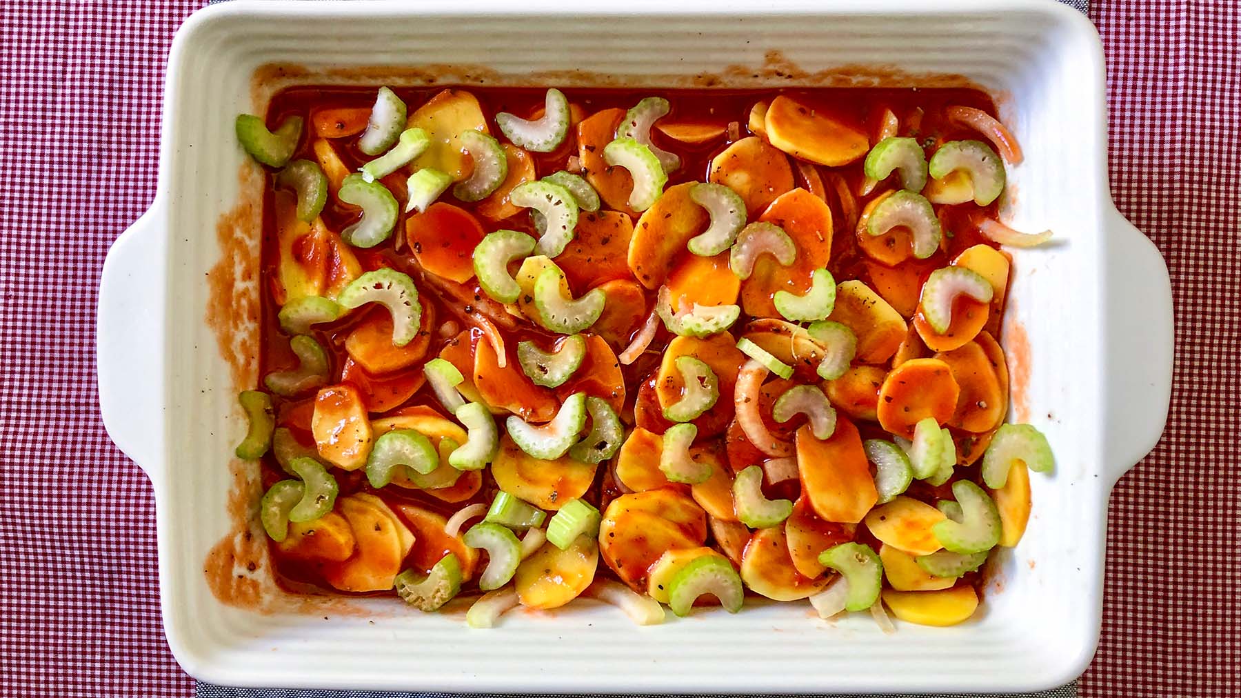 Image of Pour half of the tomato mixture over the potatoes and...