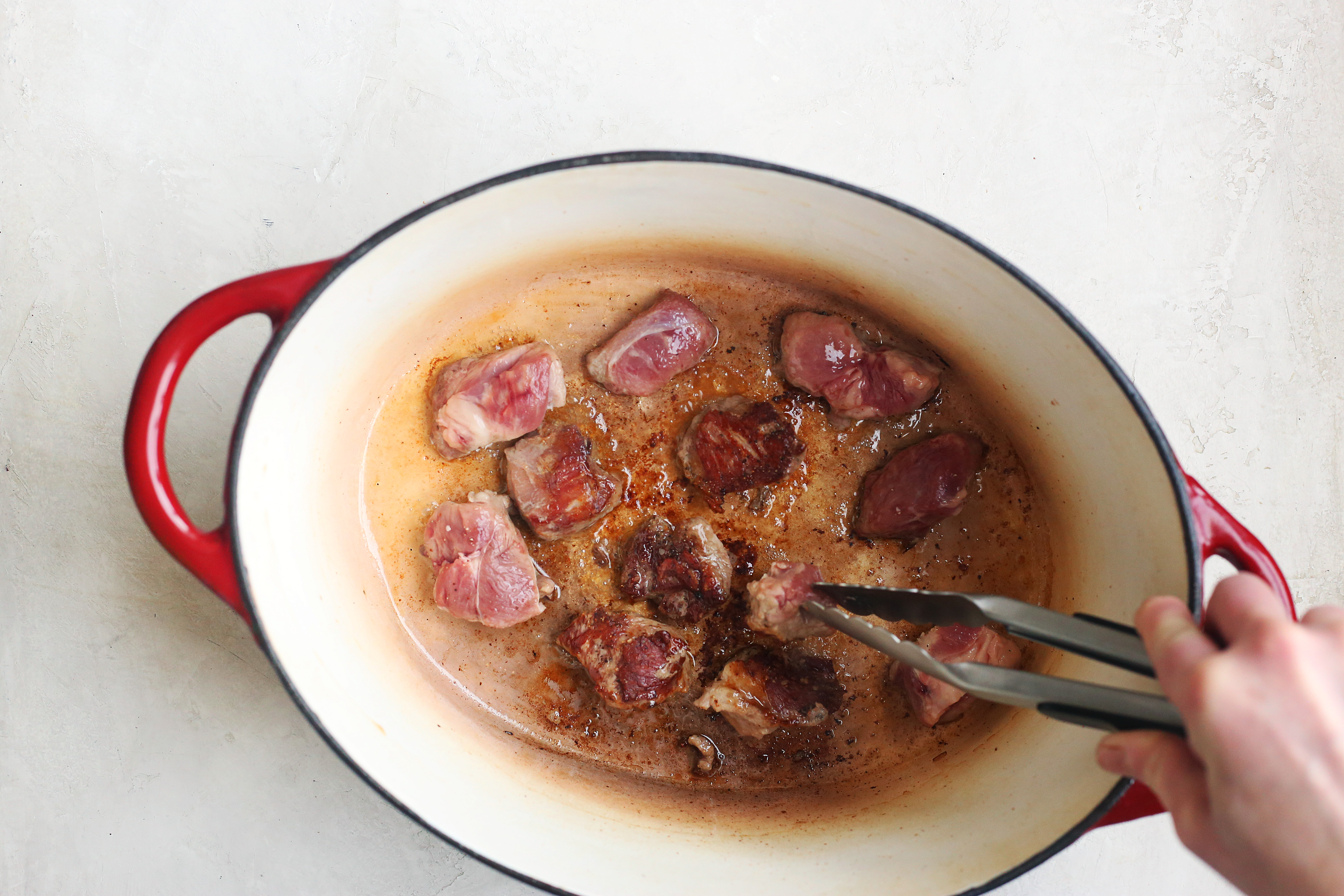 Image of Once the oil is hot, add diced lamb to the...