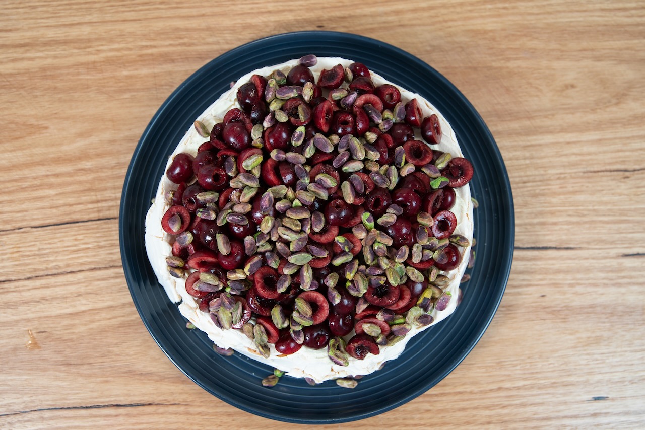 Cherry and pistachio pavlova