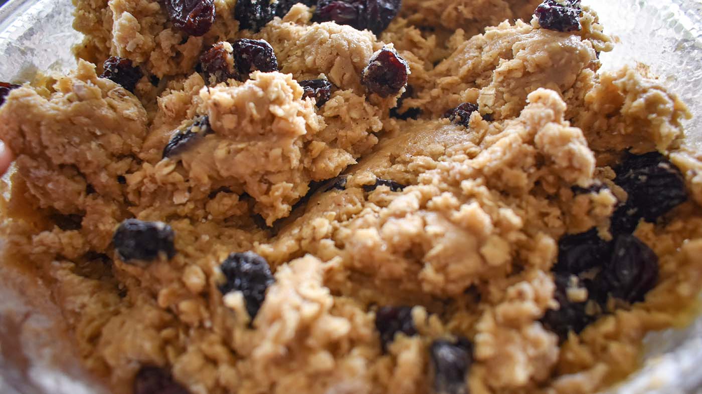 Image of In another bowl, mix dry ingredients (besides raisins). Then gradually...