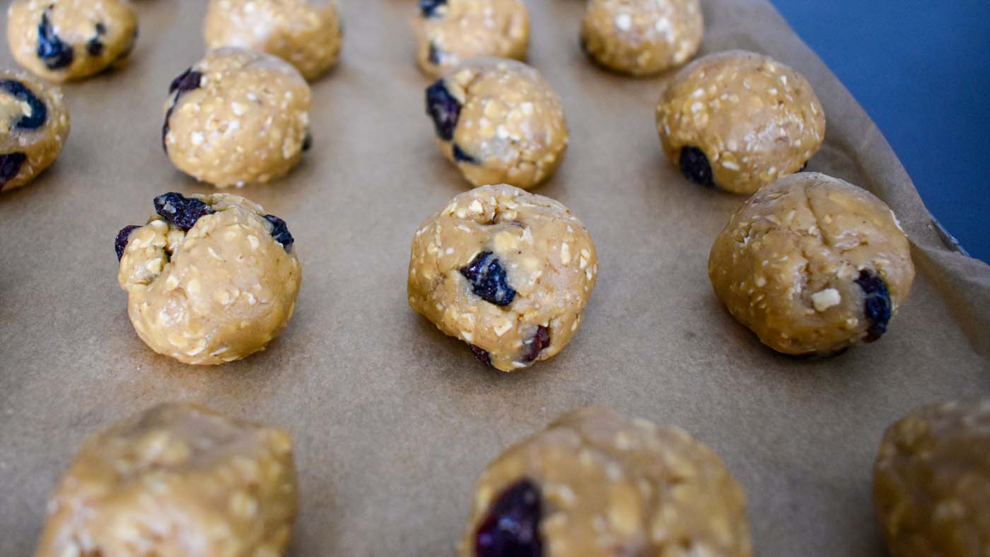 Image of Drop rounded teaspoons of dough on a covered or greased...