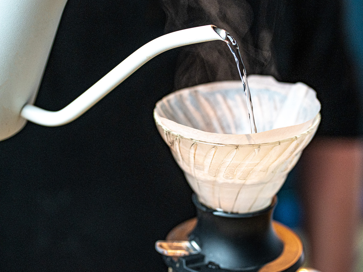 Image of Pre-heat the Switch by locking the brewer and pouring in...