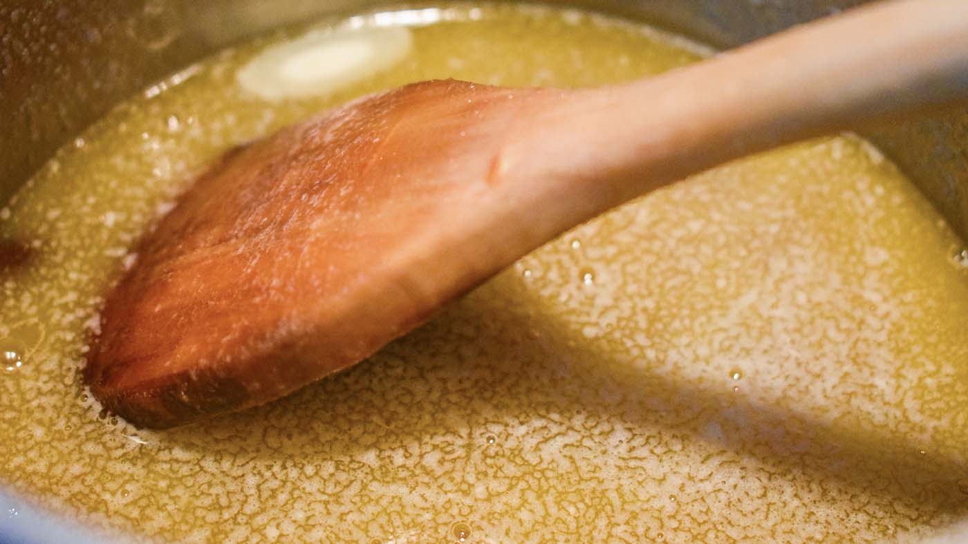 Image of In a saucepan melt butter and whisk in corn syrup...