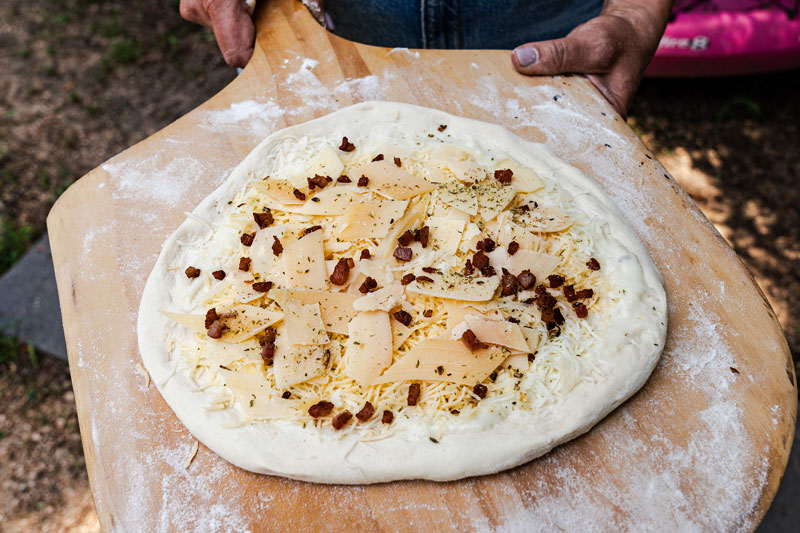 Image of Slide the pizza onto the preheated stone (you’ll have a...