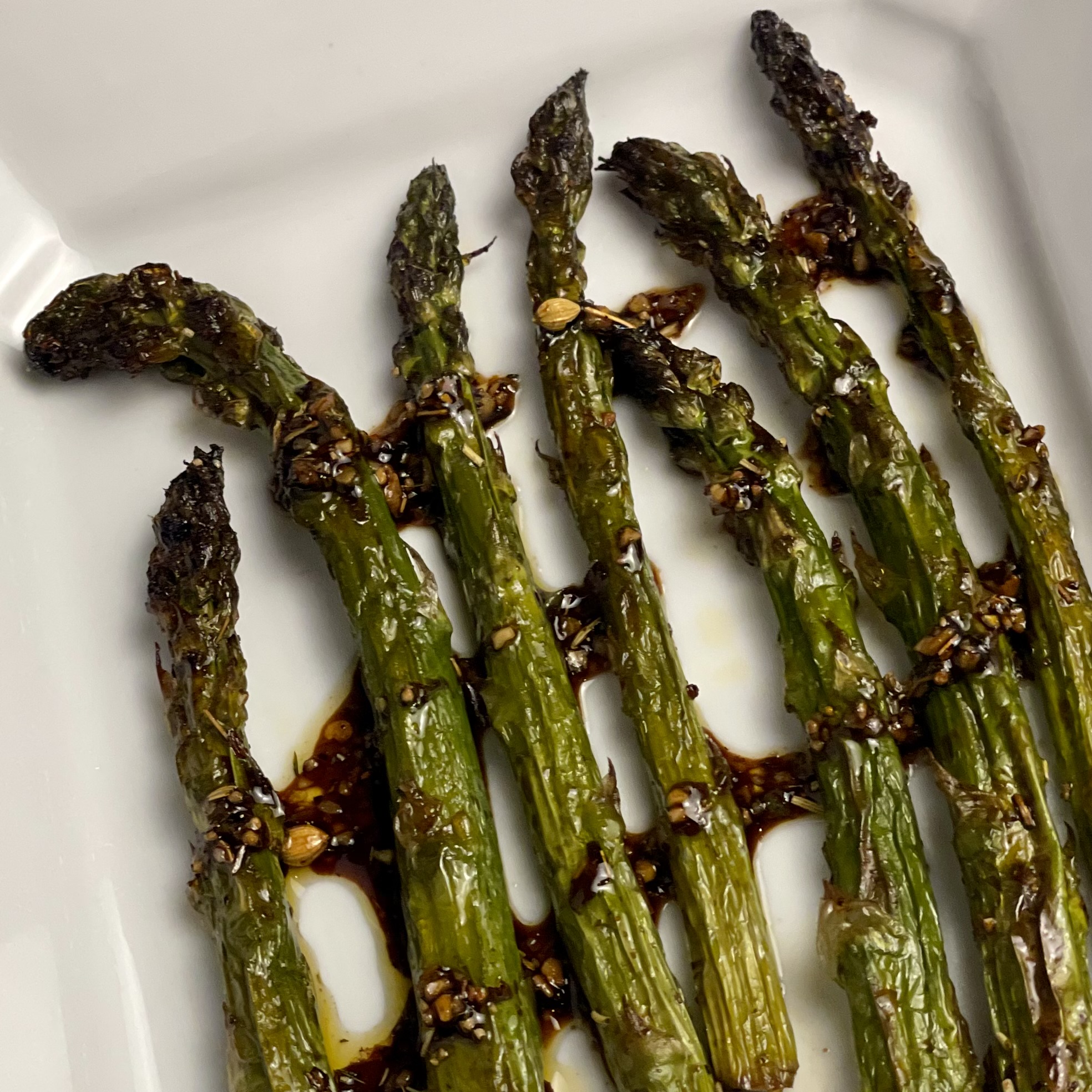 Image of Fire your grill and lay the marinated asparagus perpendicular to...