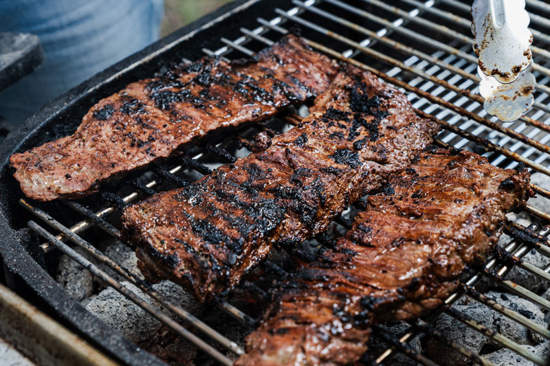 Image of Flip the steaks again a time or two, rotating them...