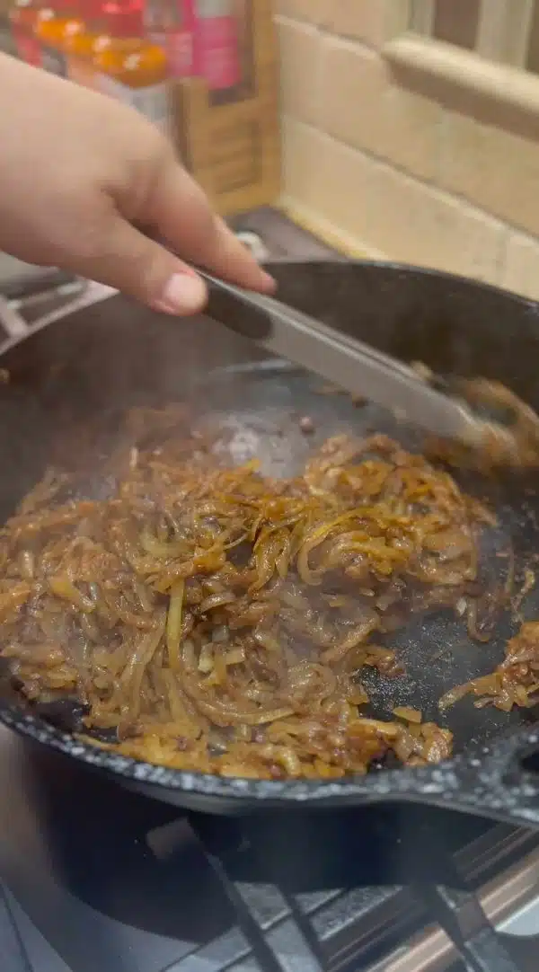 Image of Fry bacon in a large saute or cast iron skillet...