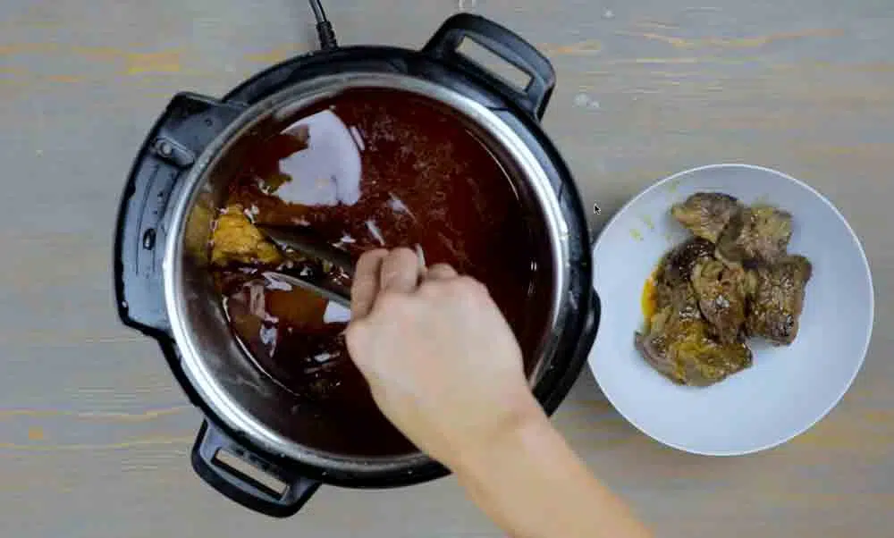 Image of Place meat into a bowl, remove the bones from the...