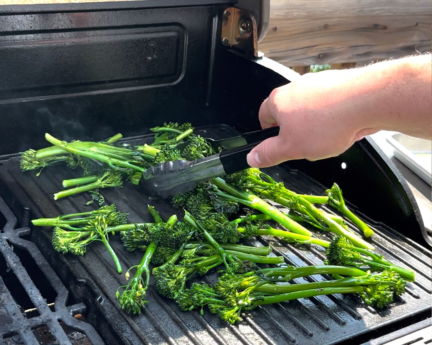 Image of Place broccolini on a large pan, drizzle with 3 Tbsp. of...