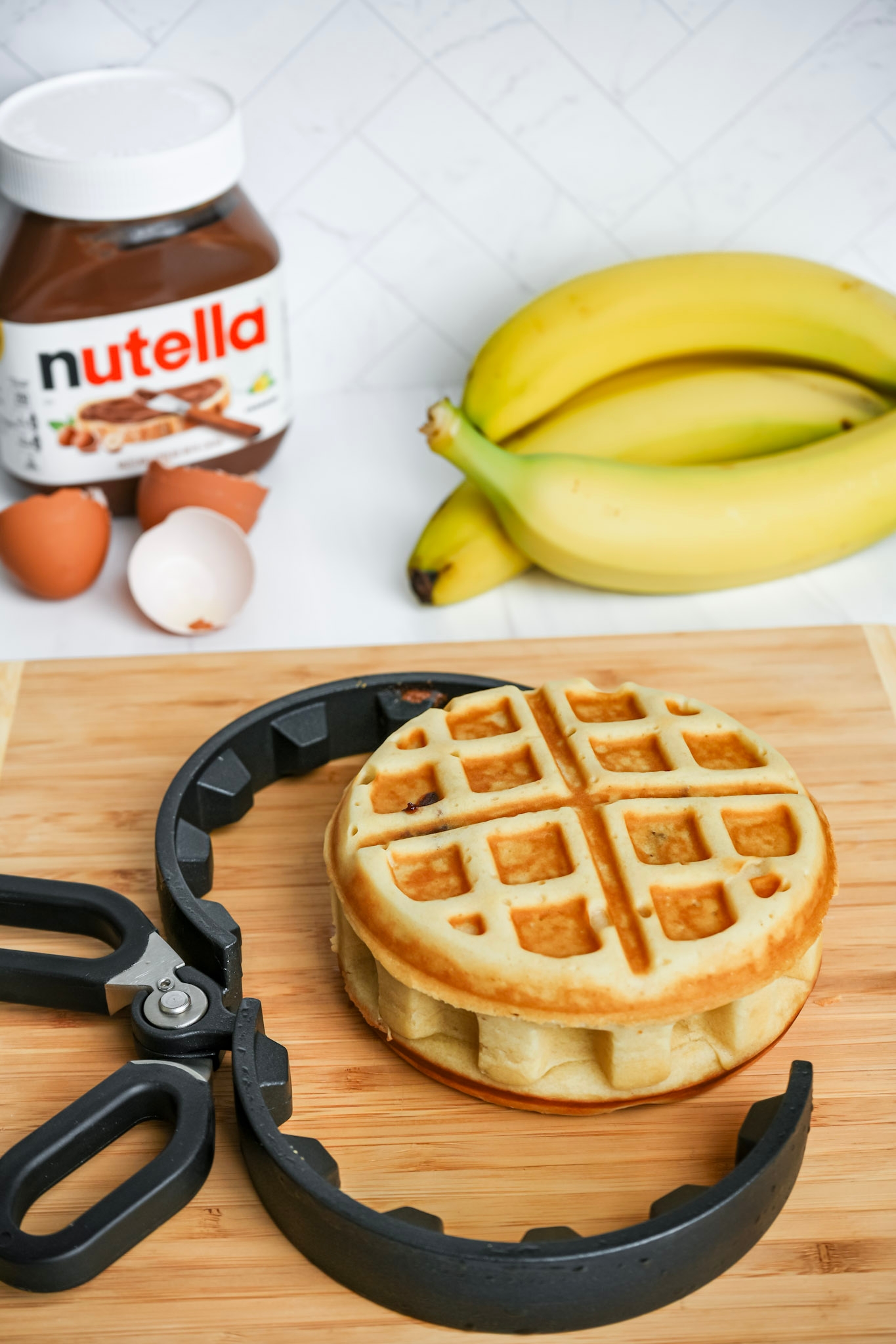 Image of Remove the waffle from The Stuffed Waffle Iron using the...