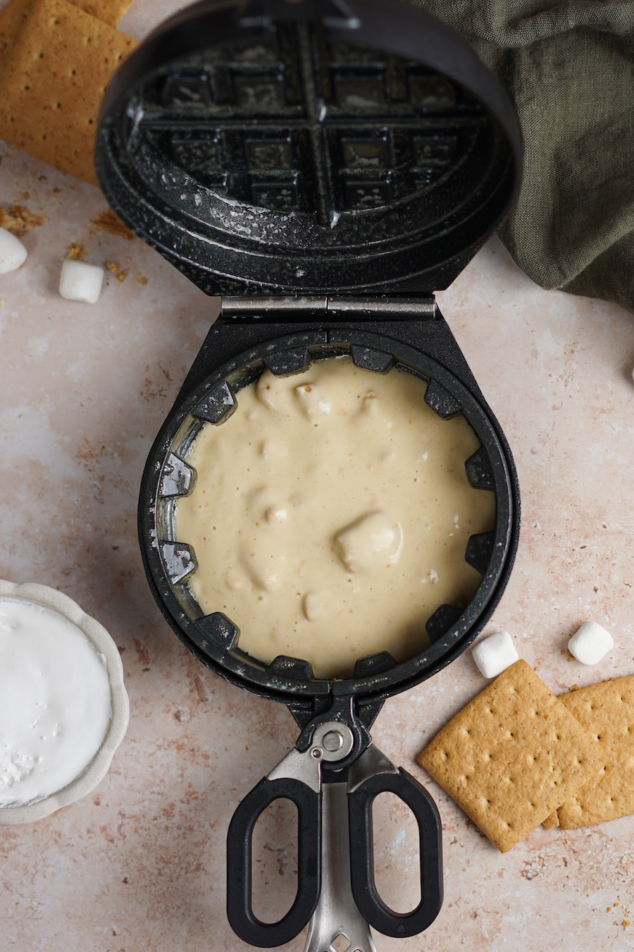 Image of Preheat The Stuffed Waffle Iron to medium heat. Add ½...